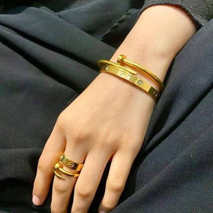 Nail & Cartier Bangle With Ring Stack